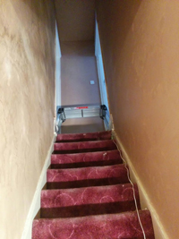 Plastering over Artex walls